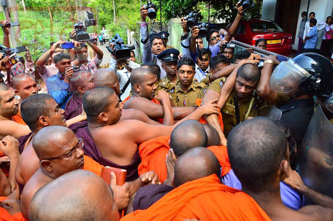 Homagama protest: two monks surrendered